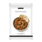 A white seasoning packet labeled EPICURE Carne Guisada, featuring a photo of a bowl of cooked meat with tortilla chips and green garnish.