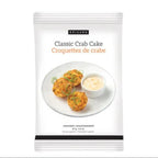 A package of Epicure Classic Crab Cake Croquettes de crabe, featuring a white bag with a photo of three golden-brown crab cakes on a plate with a side of creamy sauce.