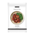 A white seasoning packet labeled EPICURE Coq au Vin SEASONING, featuring a photo of a cooked chicken dish with green beans on the front.