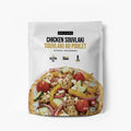 A white stand-up pouch of Epicure Chicken Souvlaki seasoning, featuring a photo of a prepared chicken and vegetable souvlaki on the front, set against a plain white background.