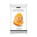 A white stand-up pouch of Epicure Fizzy Pink Sangria mix, featuring a photo of an orange drink in a glass with orange slices on the front