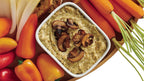 Prepared Epicure Herb & Mushroom Hot Dip Mix in a white bowl with crudites