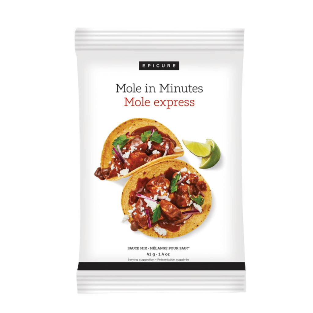 A package of Epicure Mole in Minutes Mole express sauce mix, featuring a white bag with images of two tacos topped with the sauce and a lime wedge.
