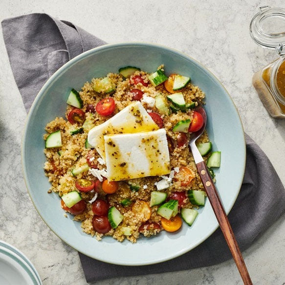 A styled overhead shot of Quinoa Salad with Jalapeno Honey Vinaigrette