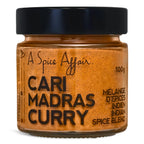 100 gm jar of Cari Madras Curry spice blend with 'A Spice Affair' branding on a white background
