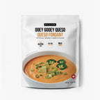 Package of Epicure Ooey Gooey Queso Hot Dip Mix with a bowl of queso on a white background