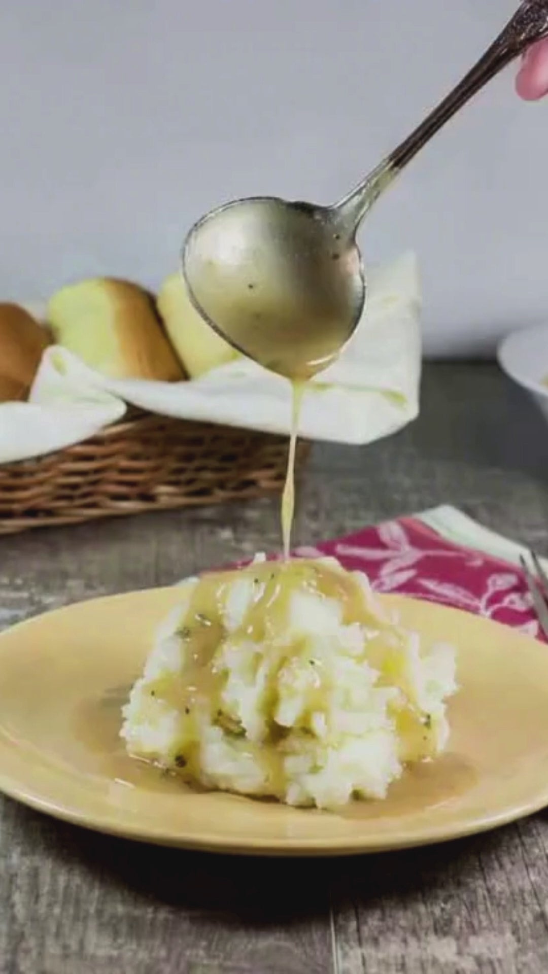 Reel showing savoury gravy being poured on mashed potatoes