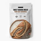 A stand-up pouch of Epicure Sweet Banana Bread (Pain Aux Bananes) baking mix, featuring a photo of a banana bread loaf with sliced bananas on the front, set against a plain white background.
